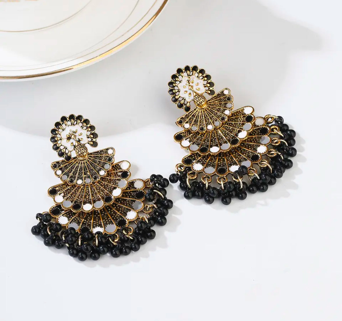 White/black peacock earrings