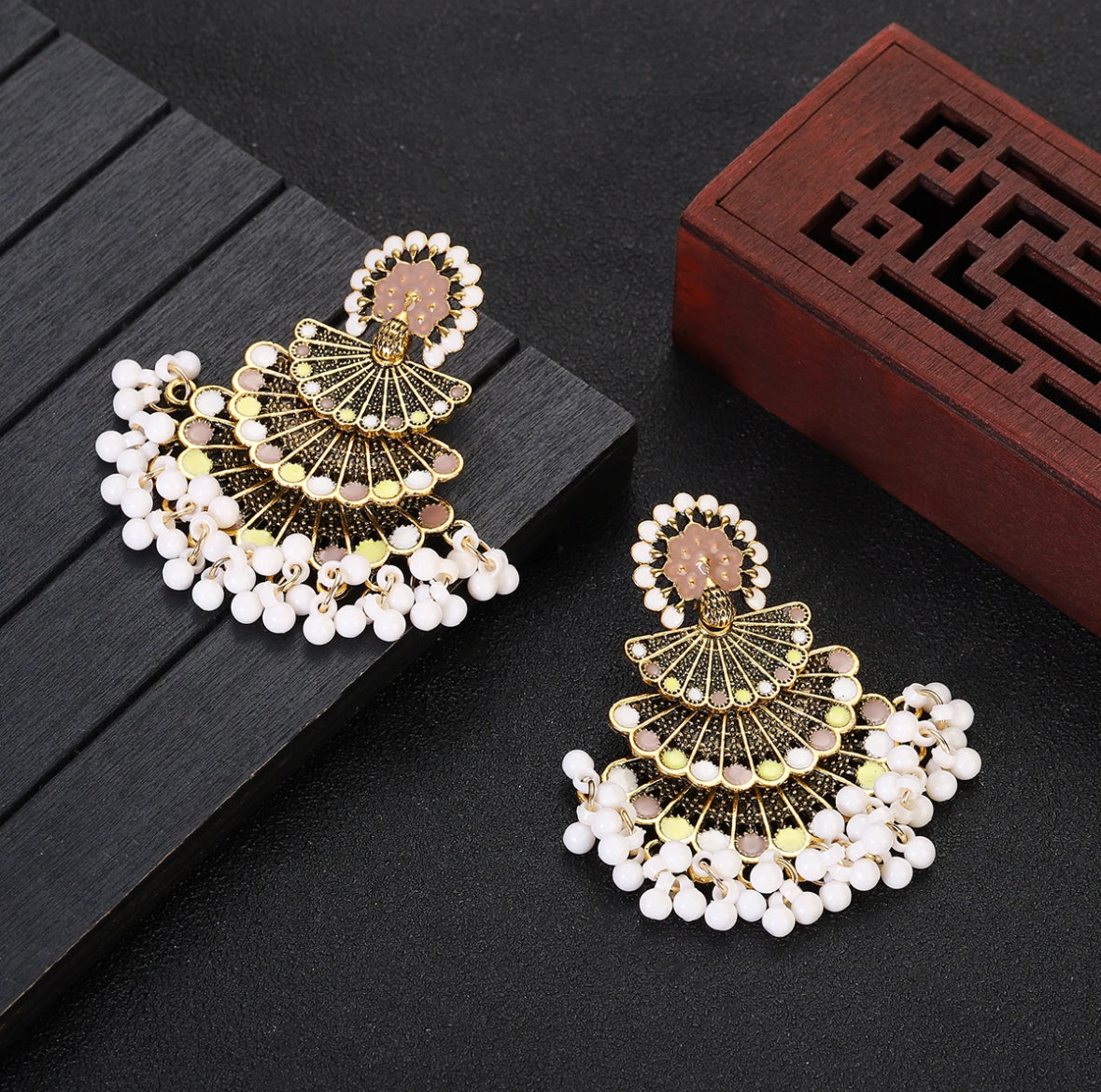 White/black peacock earrings