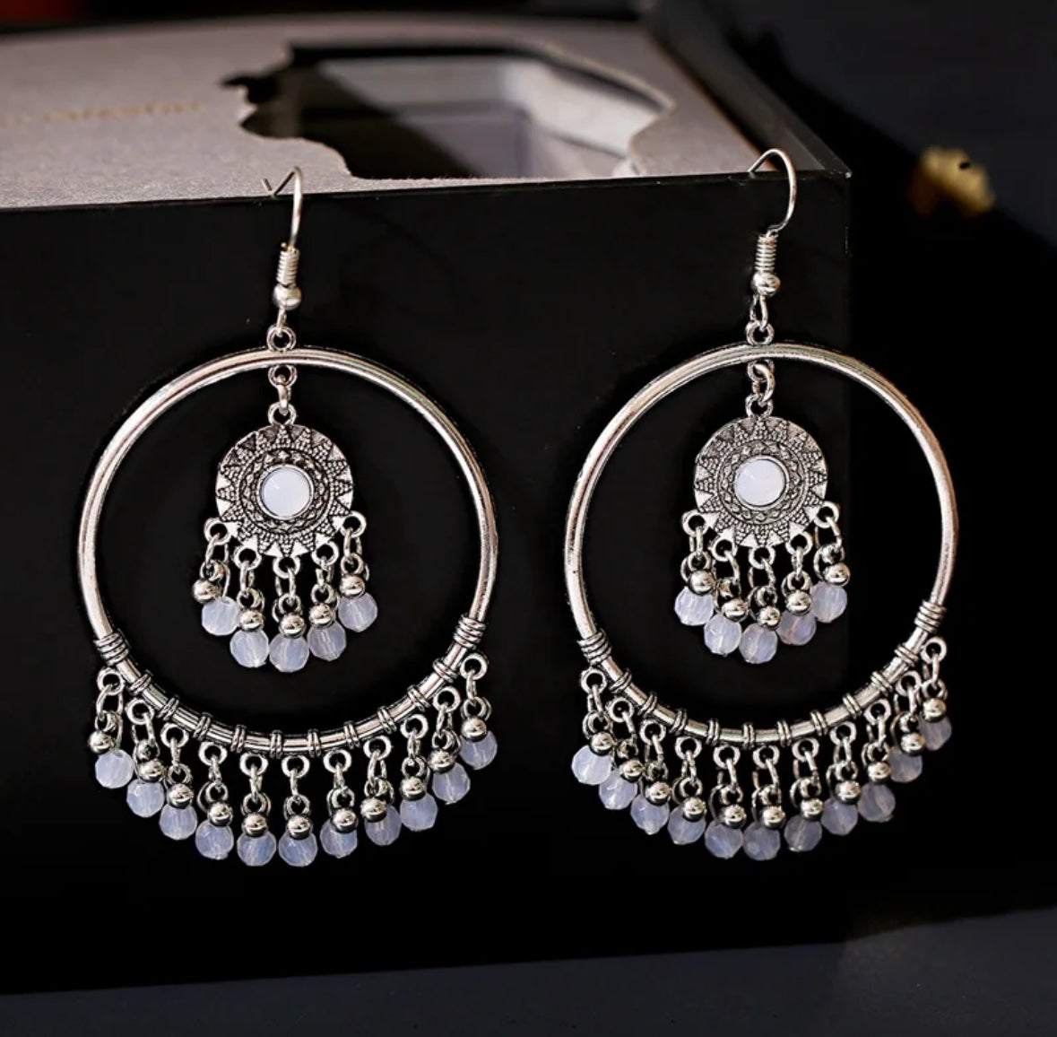 Silver mirror hoop earrings with white beads