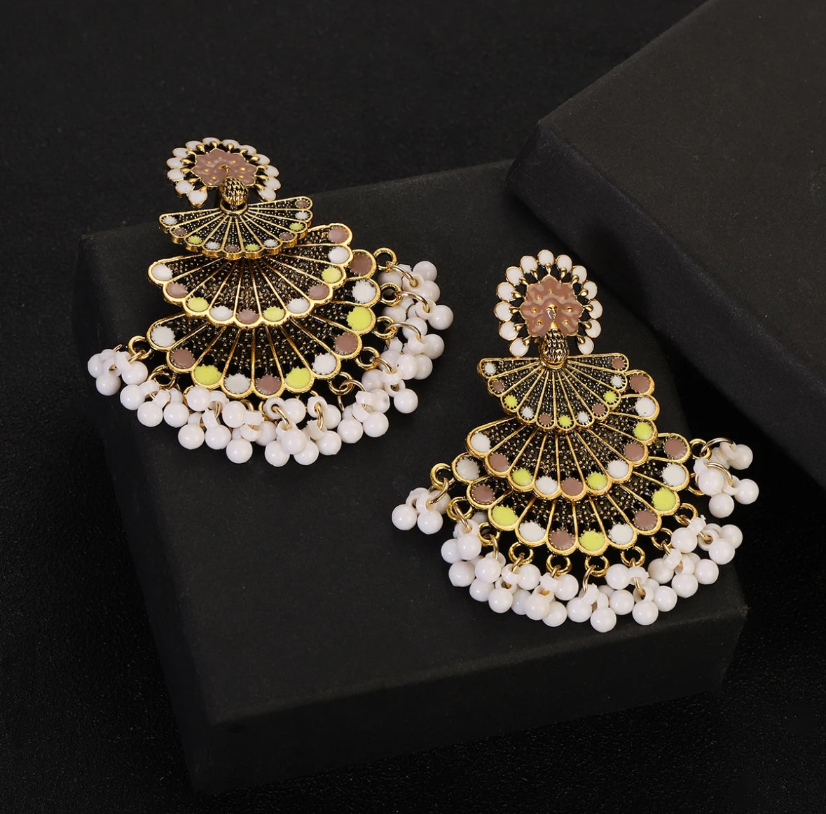 White/black peacock earrings